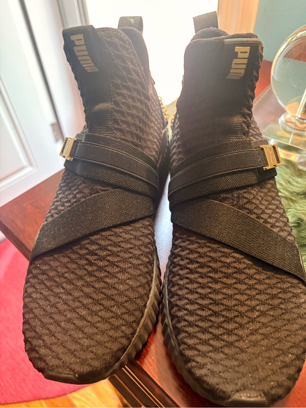 Puma WOMAN , Black Knit Slip-On Athletic Shoes with Gold Hardware